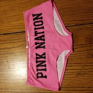 Pink nation boy short XS panty.  Bright pink, black sparkly wording,front & back